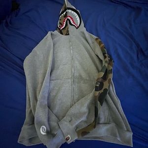 large grey/camo bape zip up jacket.